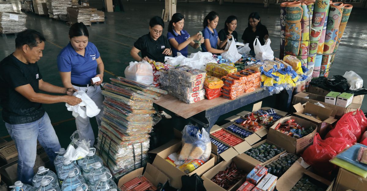 SAWO employees preparing relief goods for Cebu earthquake victims